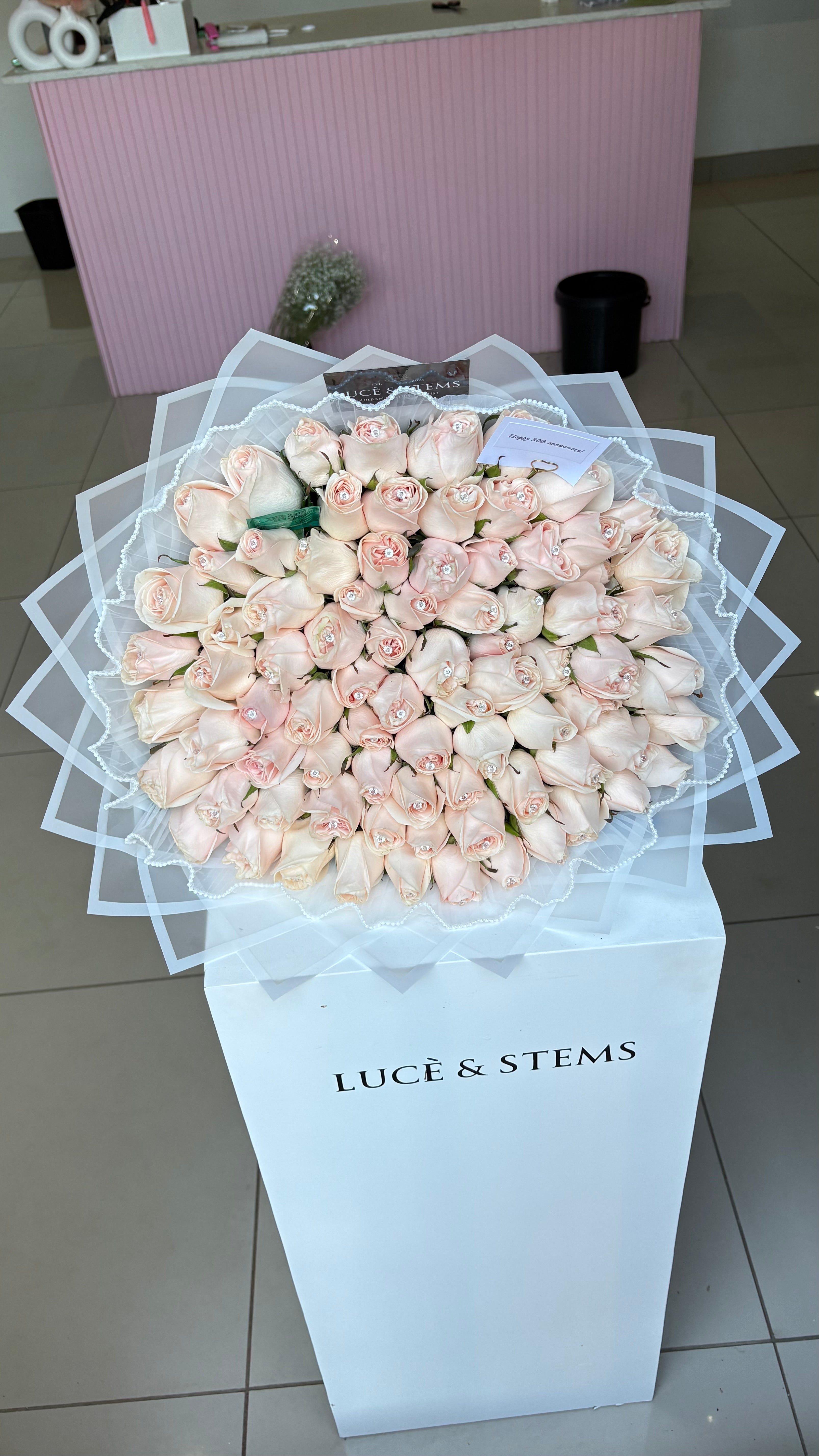 Peach/cream bouquets with lace & diamond pins