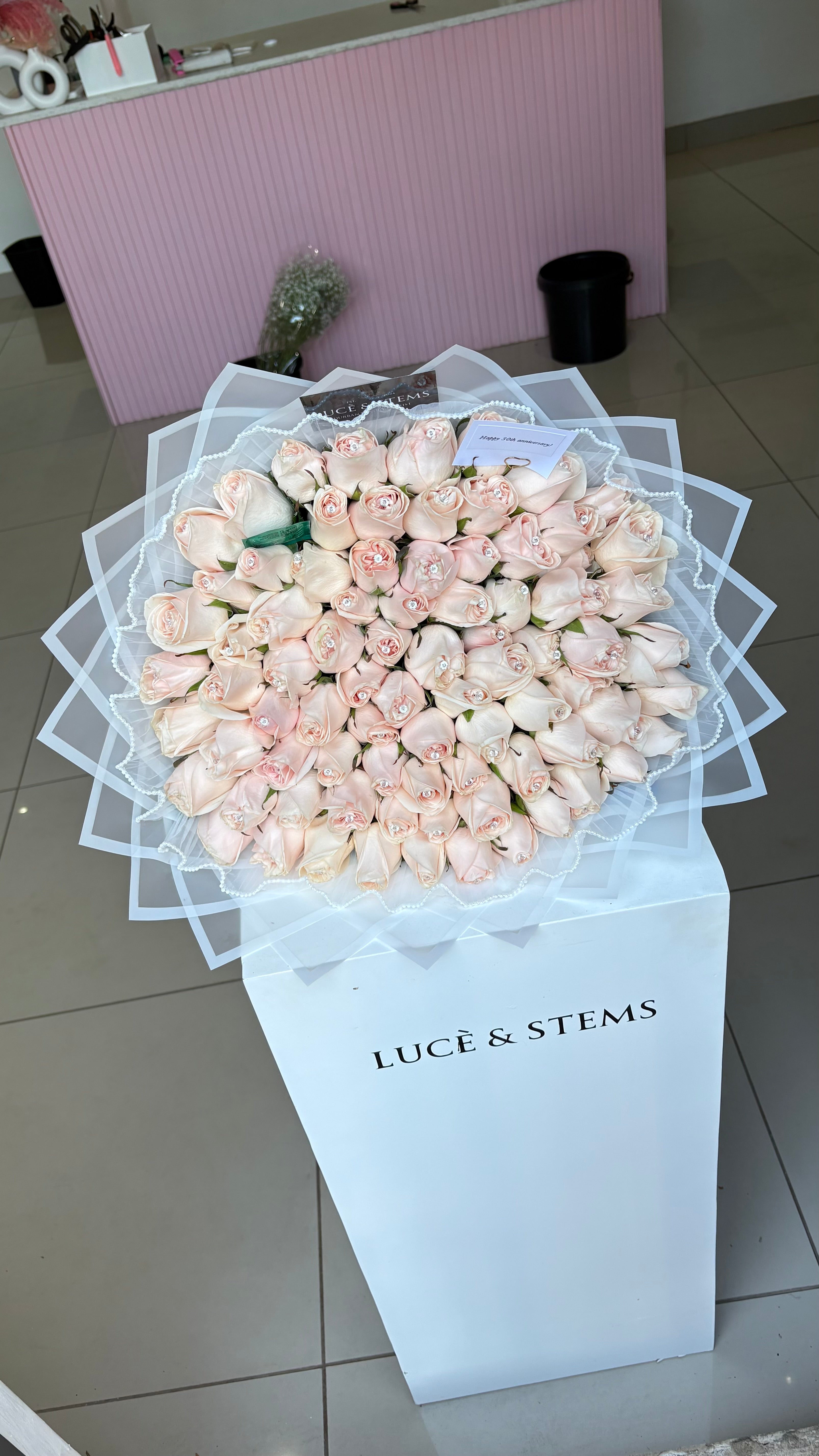 Peach/cream bouquets with lace & diamond pins