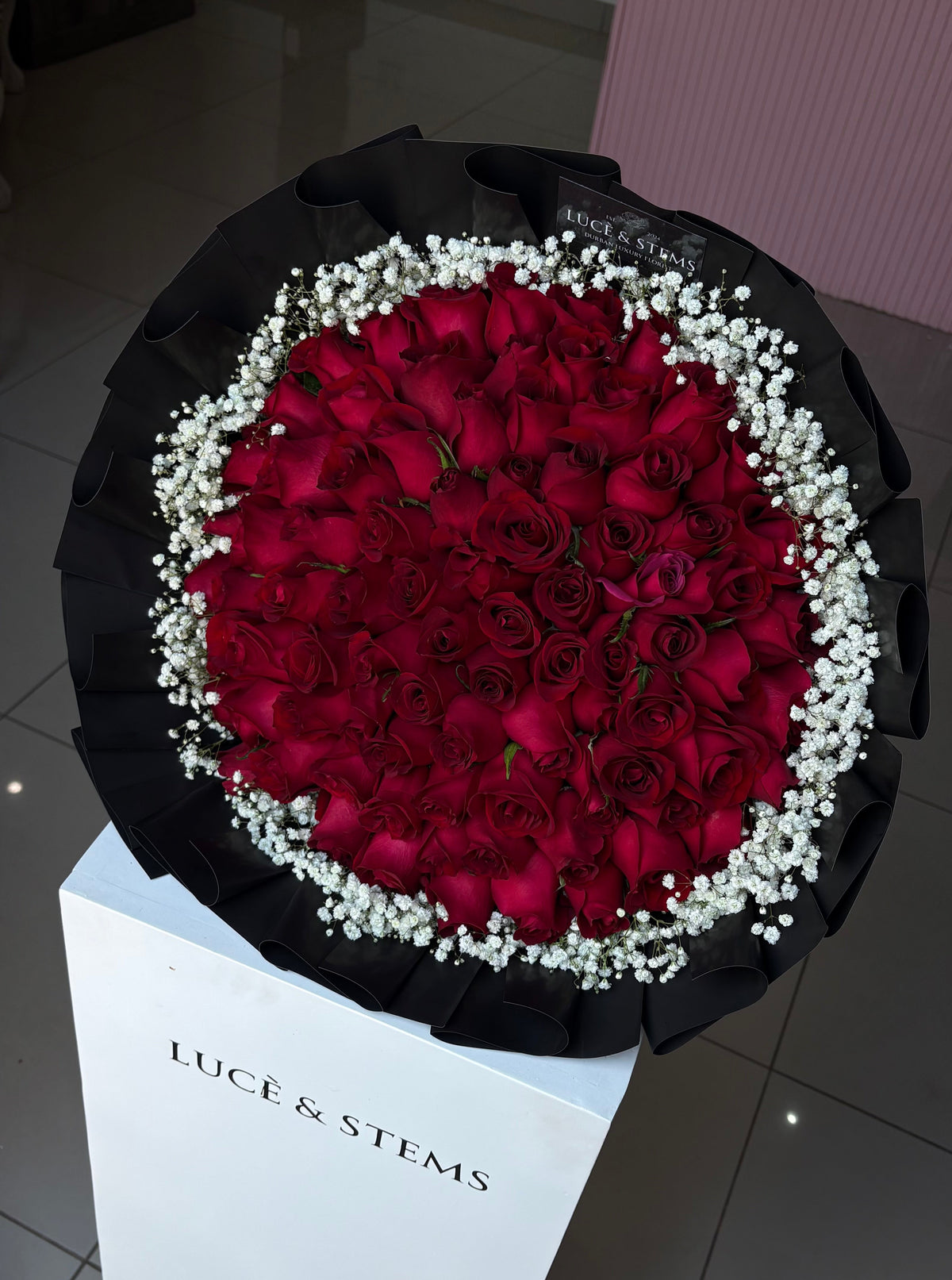 Red rose bouquet with baby’s breath (layered wrapping)