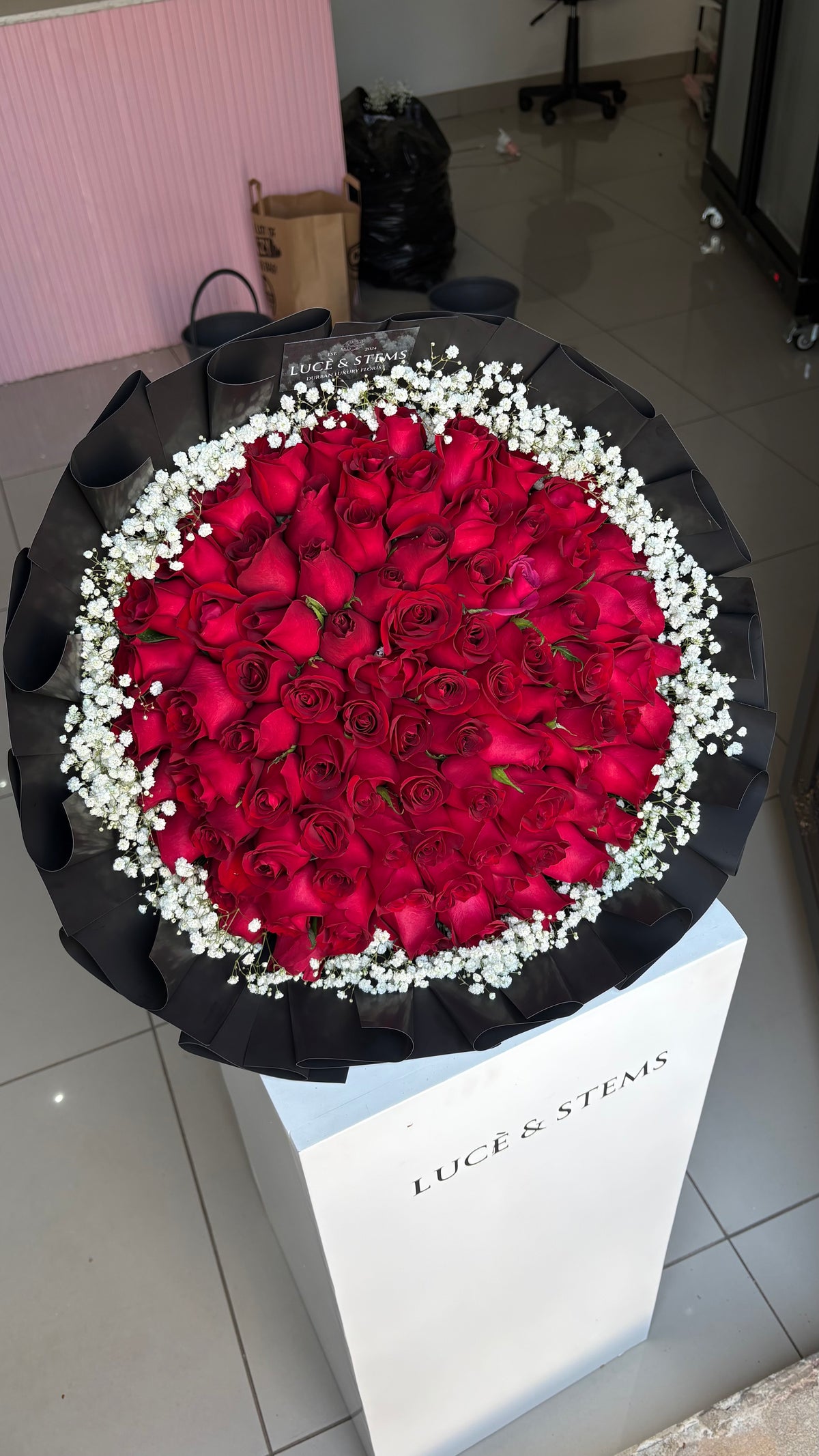 Red rose bouquet with baby’s breath (layered wrapping)