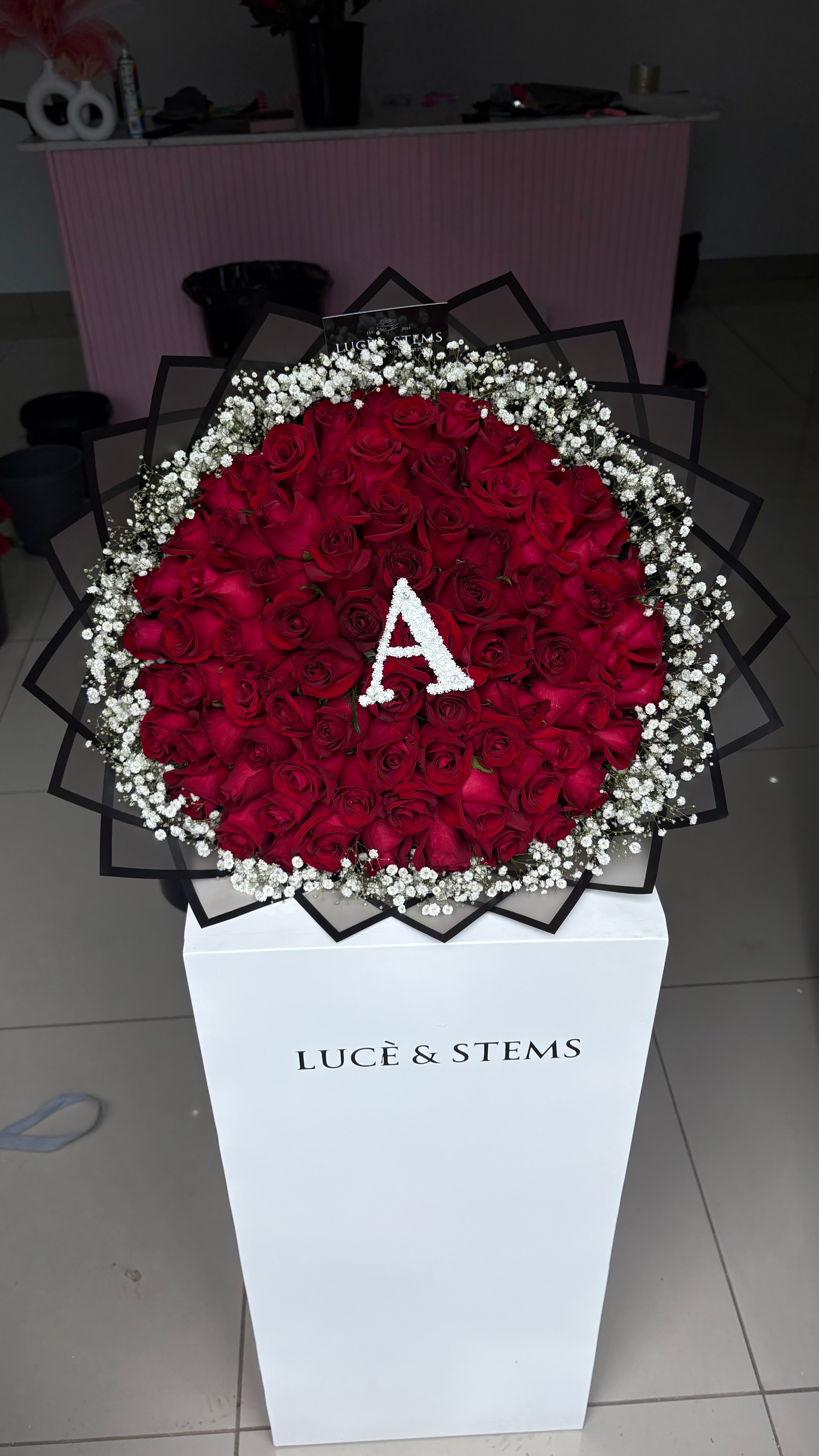 Red Rose Bouquets with initial, heart, and baby's breath