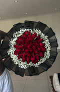 Red rose bouquet with baby’s breath (layered wrapping)