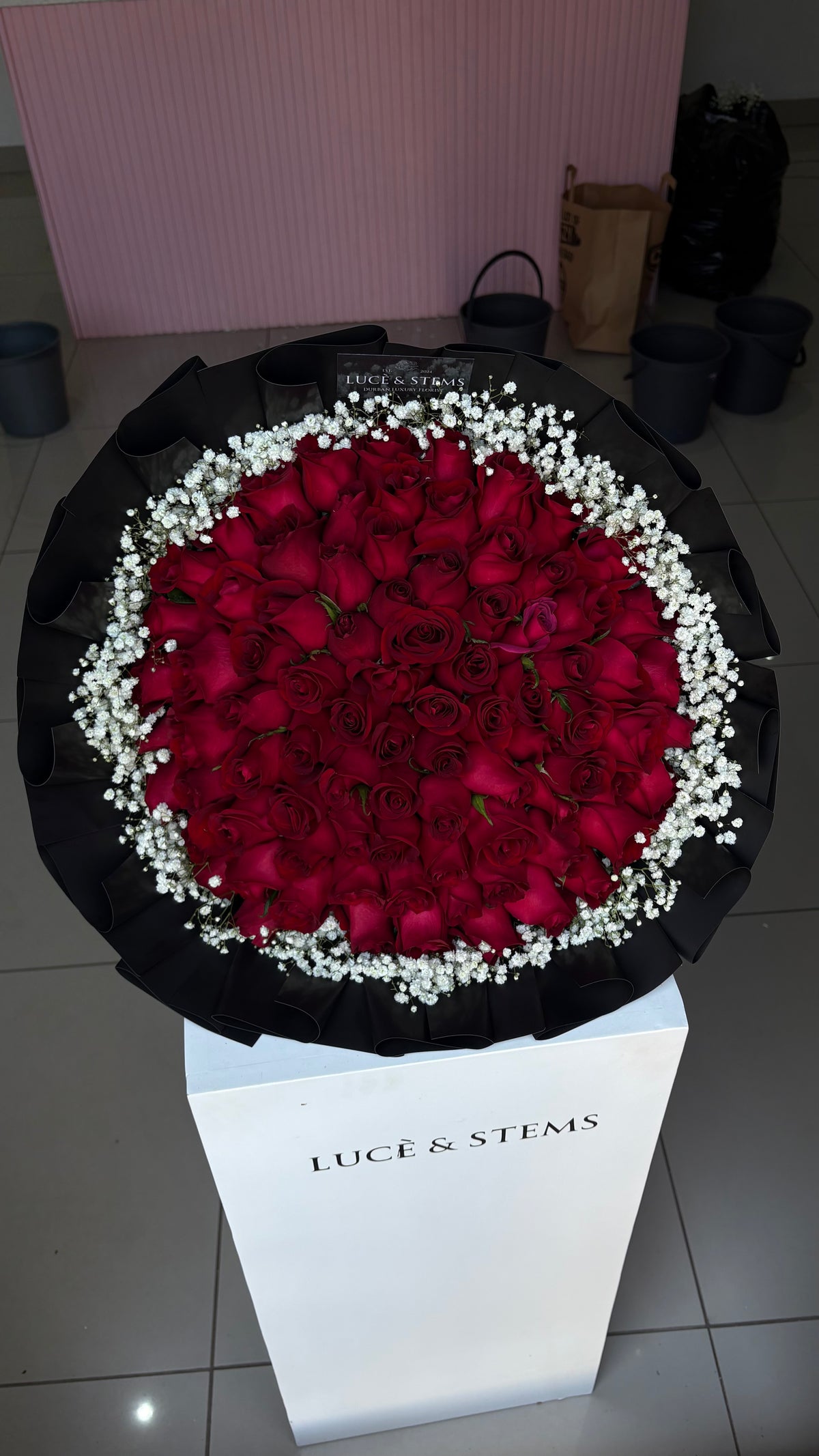 Red rose bouquet with baby’s breath (layered wrapping)