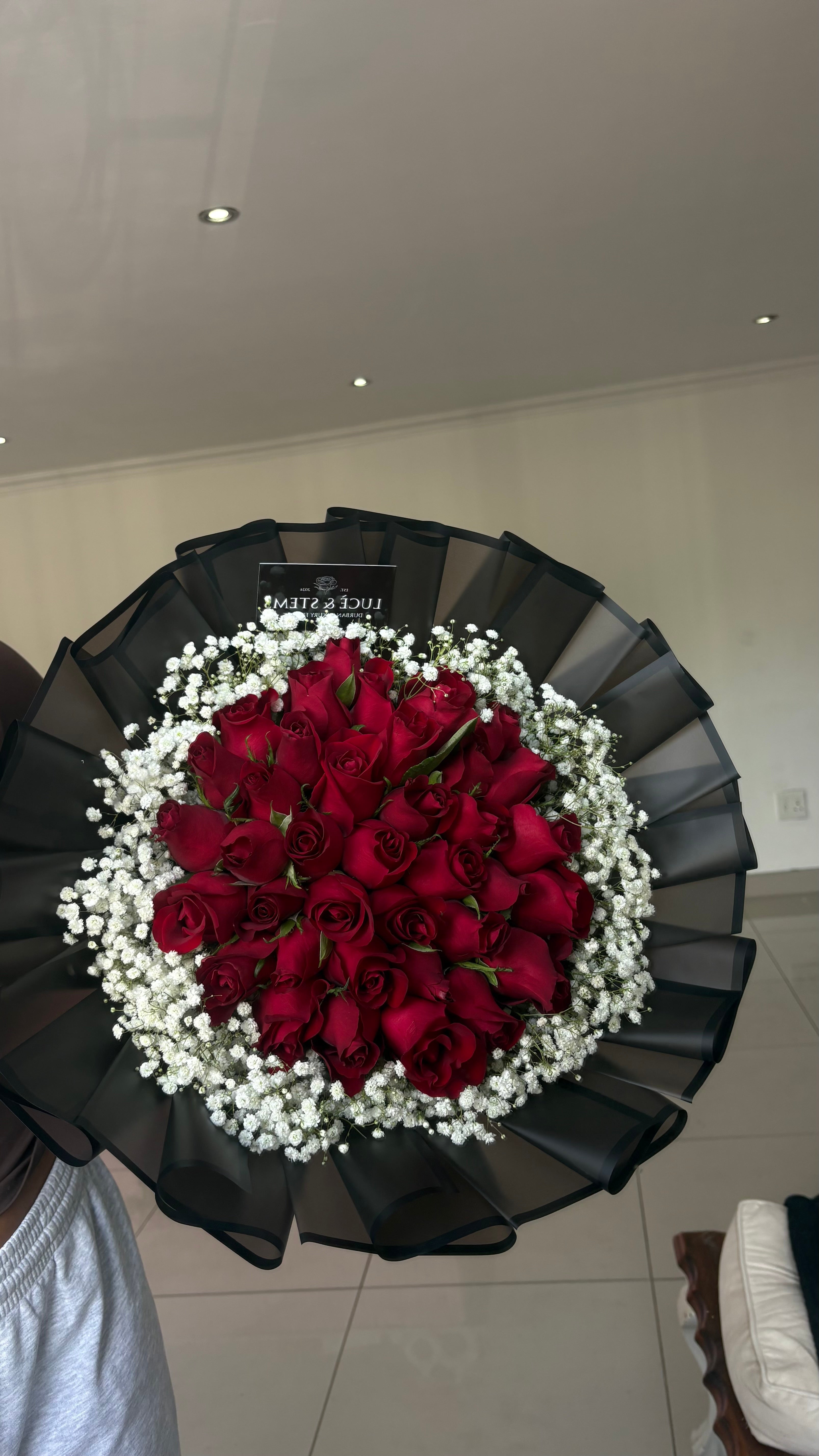 Red rose bouquet with baby’s breath (layered wrapping)