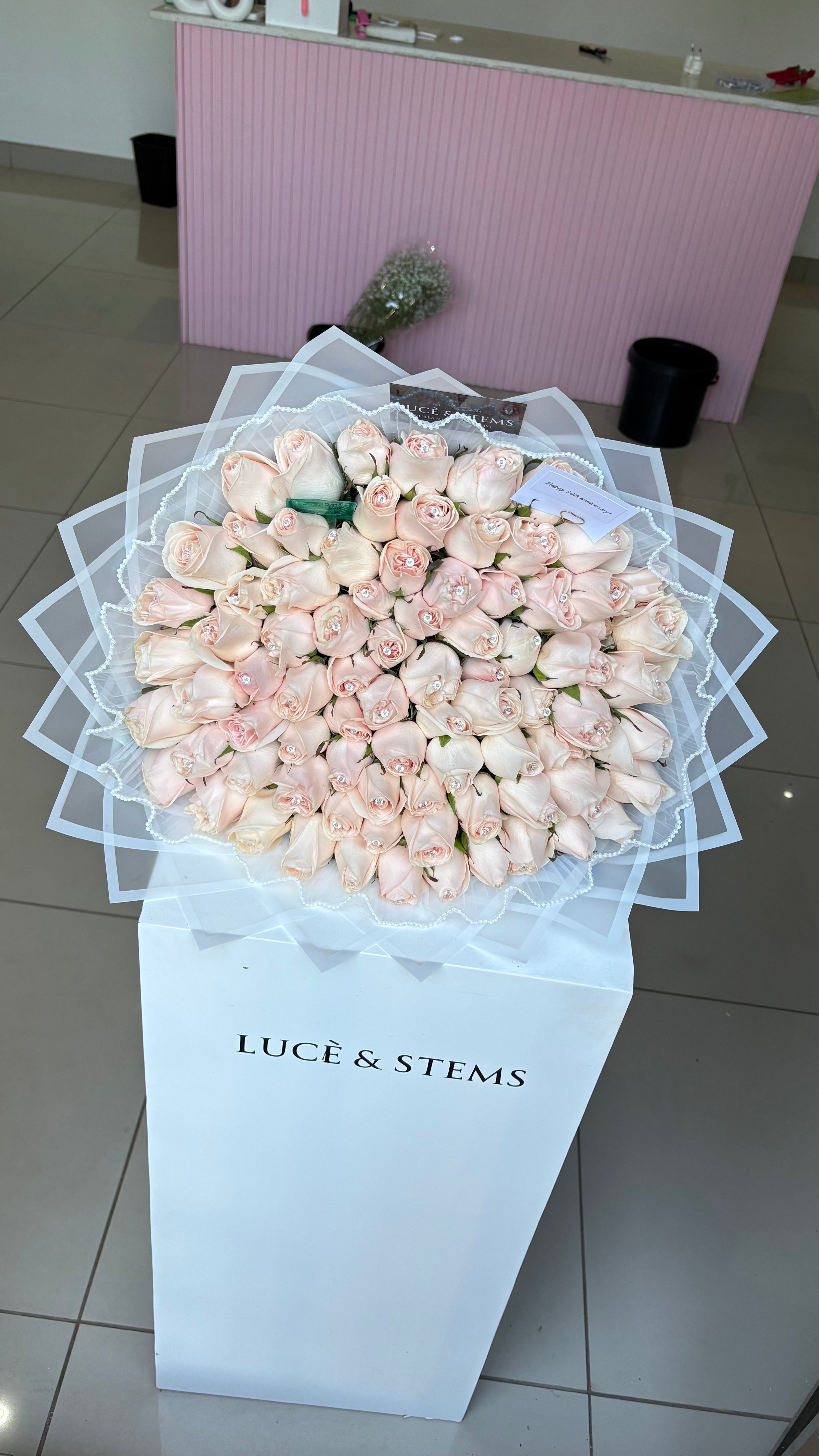 Peach/cream bouquets with lace & diamond pins