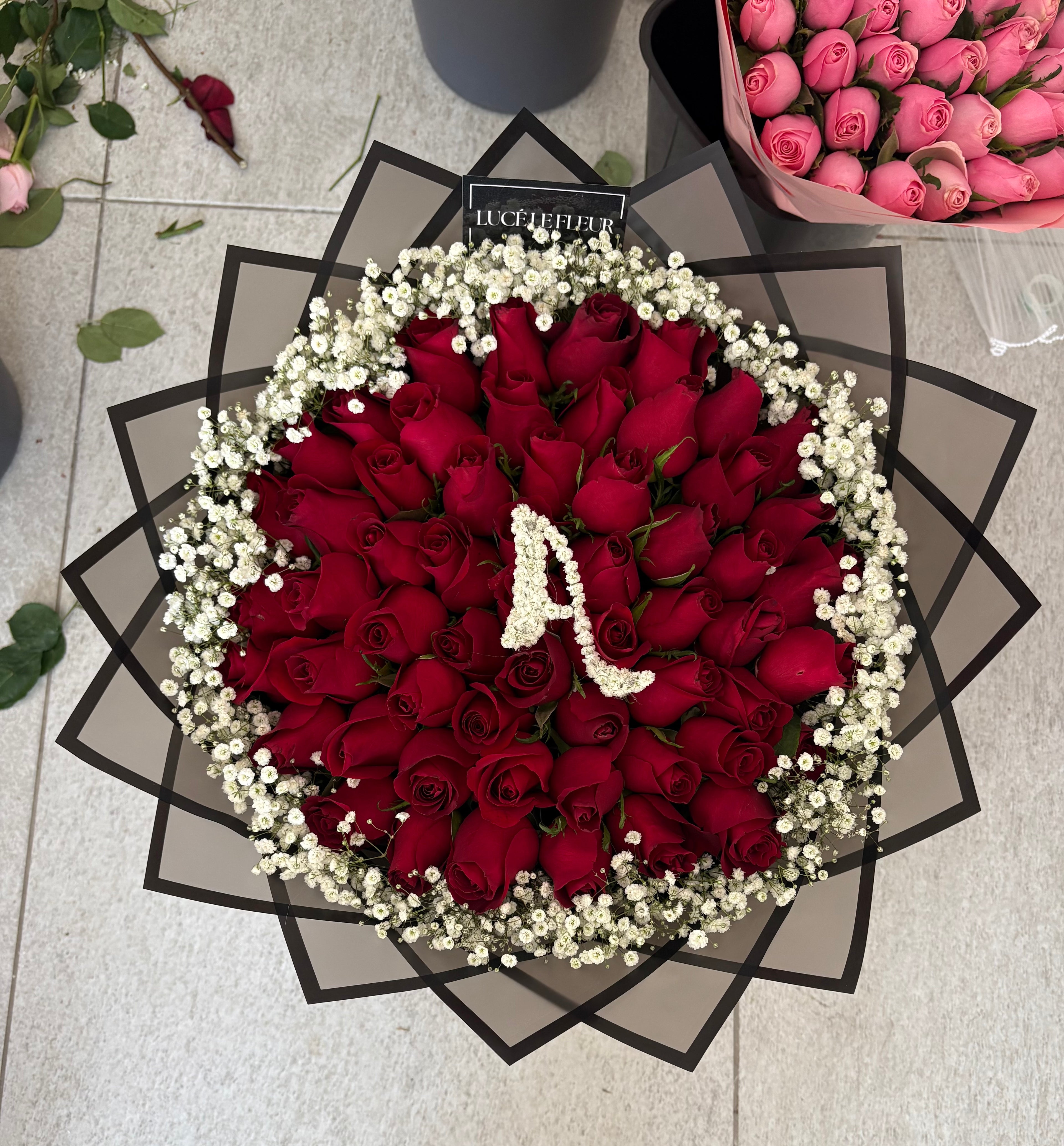 Red Rose Bouquets with initial, heart, and baby's breath