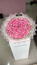 Pink rose bouquets with baby’s breath/ Gyp